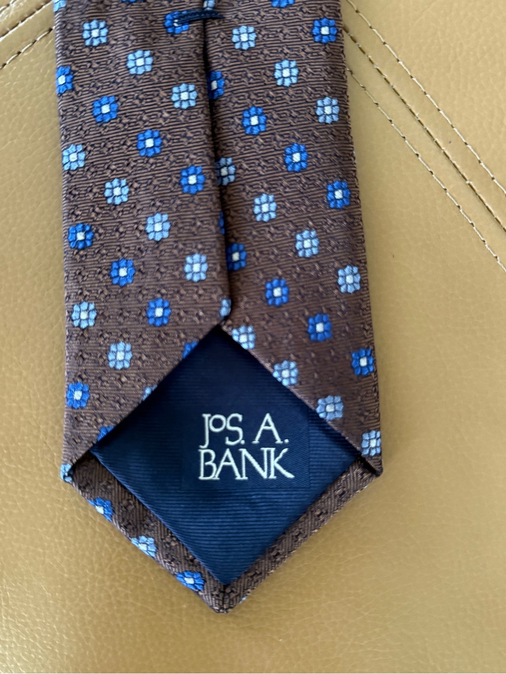 Jos. A. Bank Brown Tie with Blue Floral Medallions